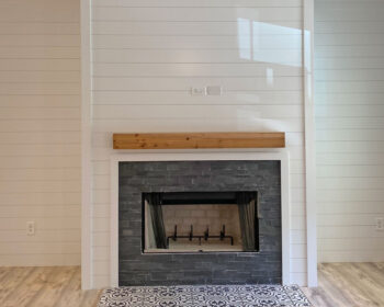 Shiplap with flagstone fireplace rough wood mantel